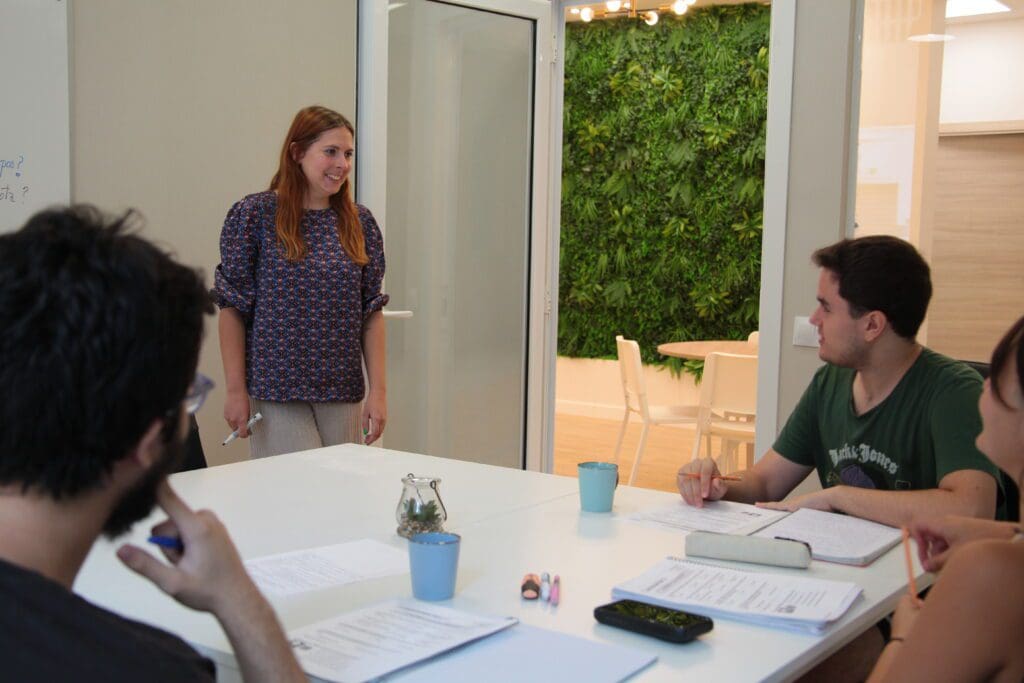 Group class in session with a teacher at Vamos Academy, Málaga