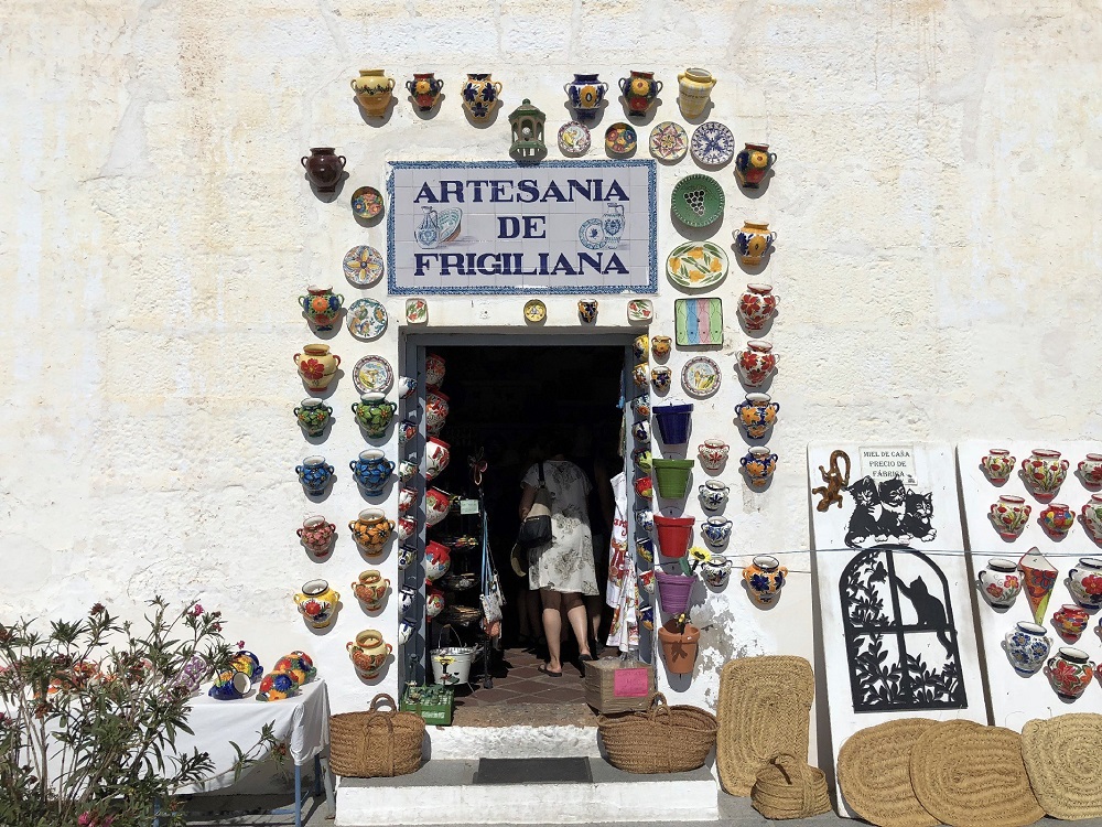 Outside an artisan shop in Frigiliana, Malaga, Andalusia, Spain.