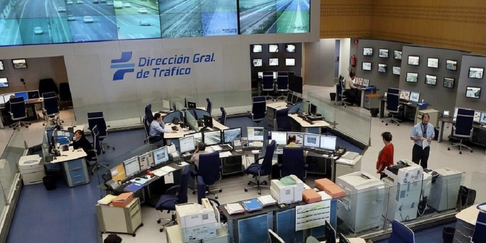 Some workers inside the DGT, checking a driver´s driving license. 