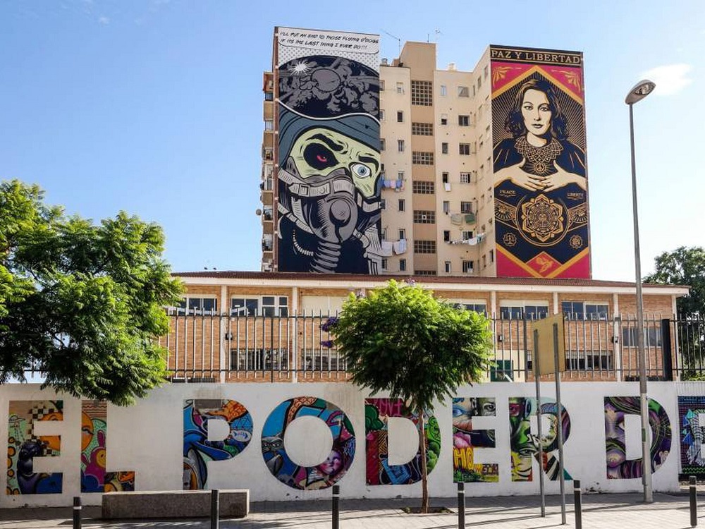 A colorful mural on a building in Soho, Malaga, showcasing the neighborhood's vibrant art scene.