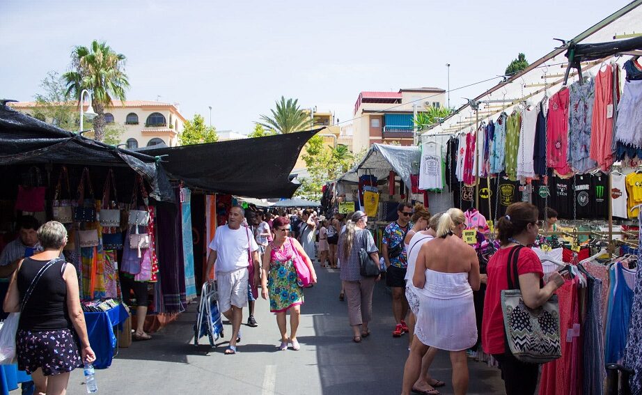 People shopping in the weekly markets of Torrox.